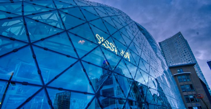 glass building under cloudy sky during daytime